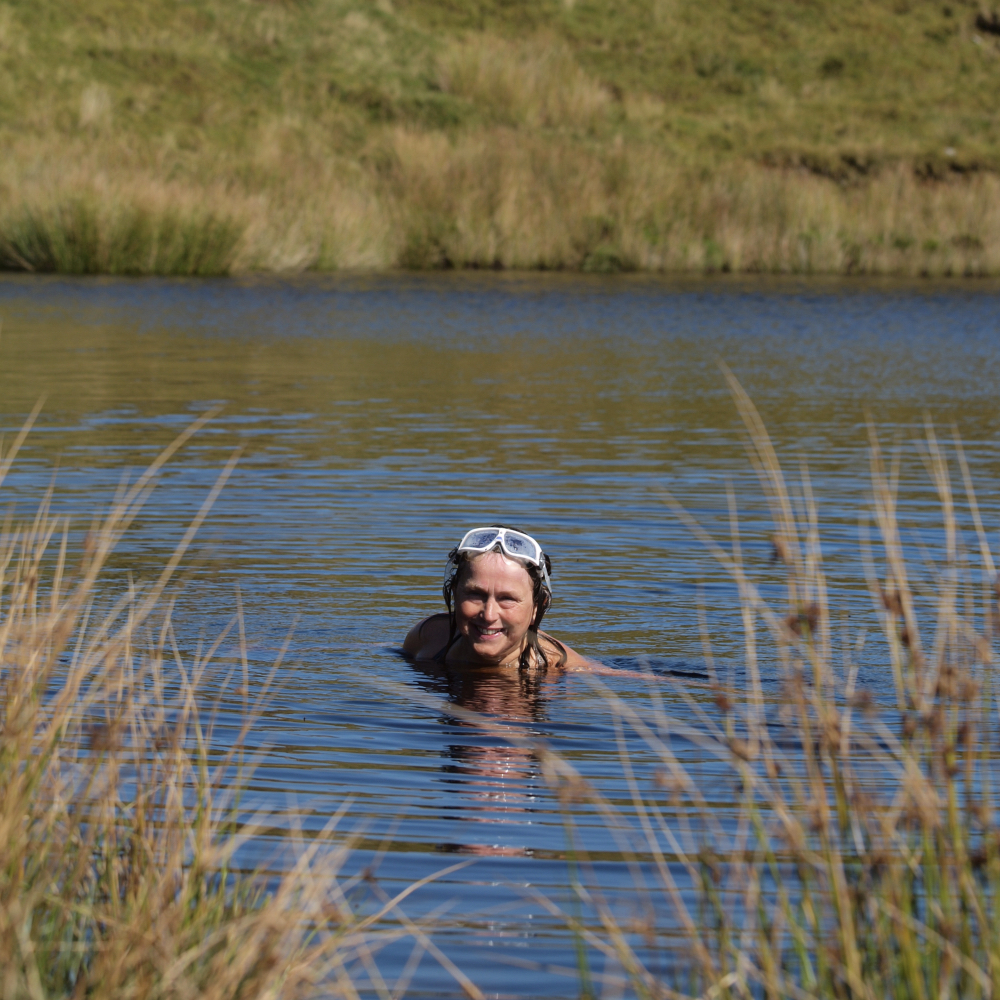 Photo of someone swimming in a lake