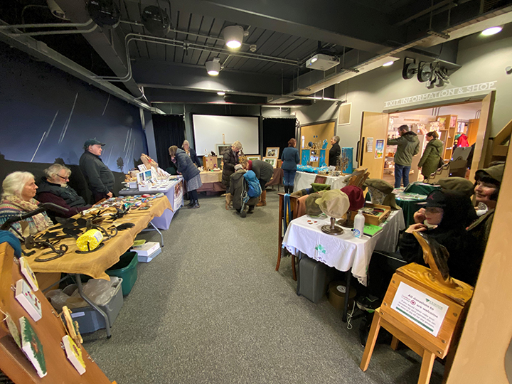 Photo of stalls at an indoor craft fair