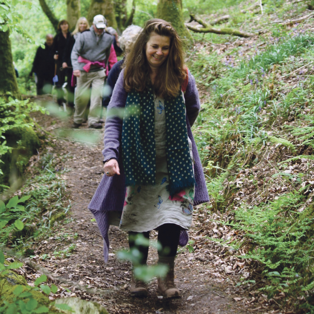 Photo of people walking in woods